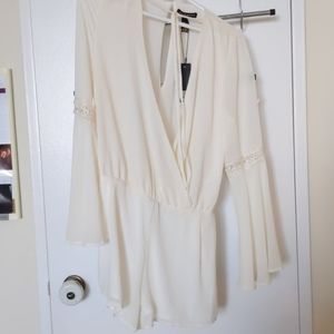 Cream coloured romper